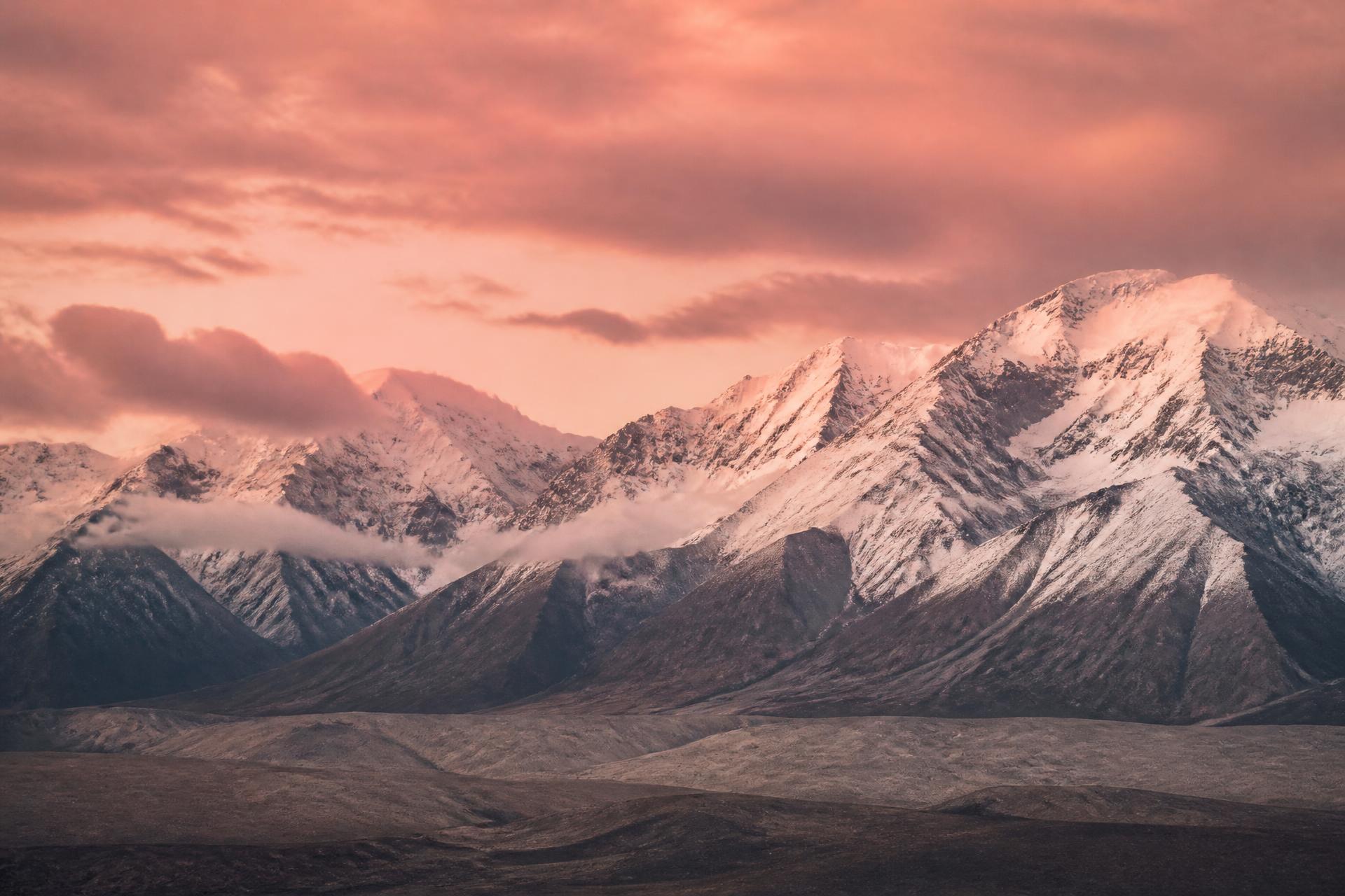 Snow-capped mountains at dawn